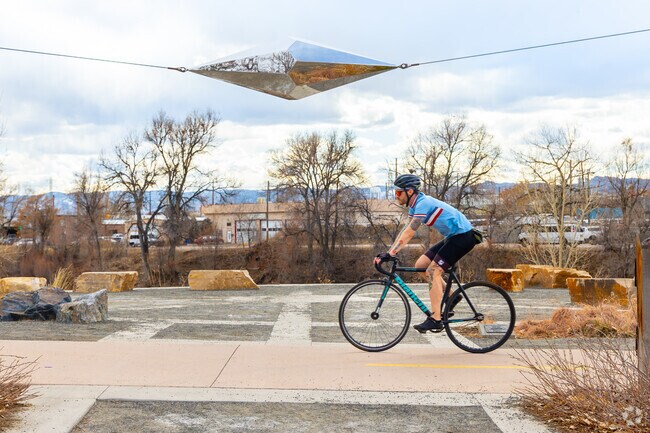 Ride the S Platte River trail in Grant Frontier Park to admire sculptures and river views in College View-South Platte.