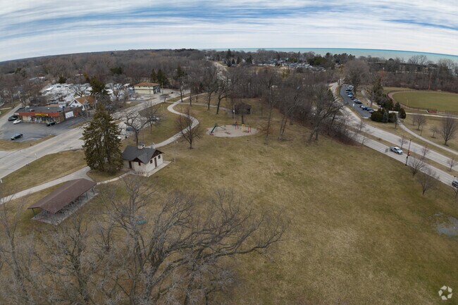 The amenities at Alford Park include an open grassy area, a pavilion, and a playground.
