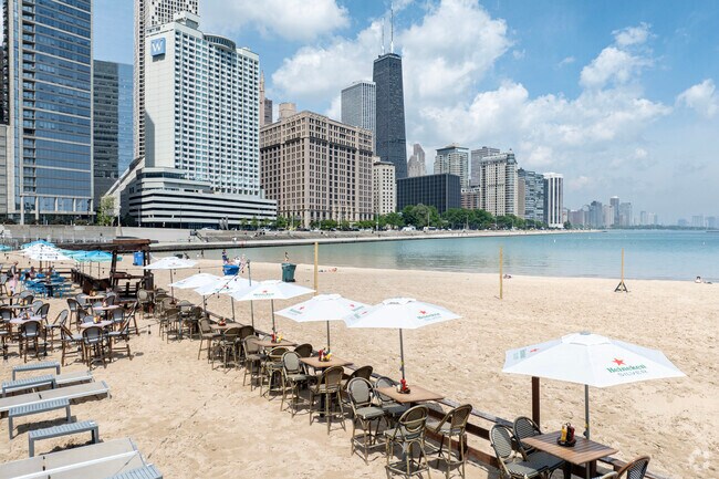 Skyline views and al fresco dining at Caffe Olivia's elevates the day at Ohio St Beach.