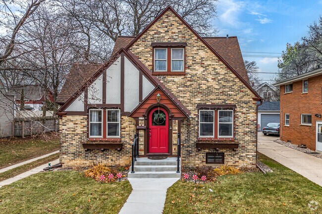 A perfect, tudor-style home stands proudly in Honey Creek.