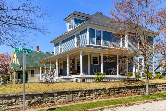 A large American Foursquare home in Old Northeast that has been converted to student housing.