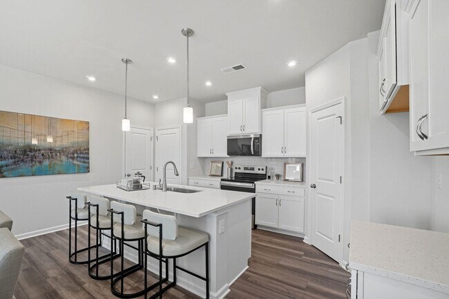 Photo representation of a future townhome plan. Colors, finishes and options will vary.