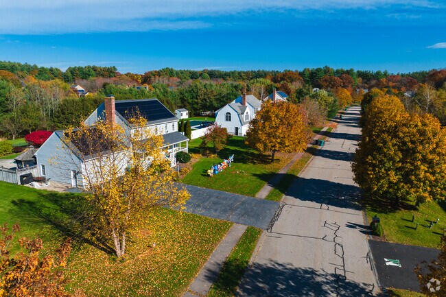 Some Upton homes welcome their owners with large front lawns and driveways.