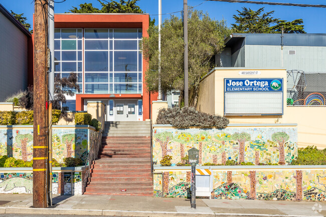 The entrance to Ortega Elementary steps up off the street.