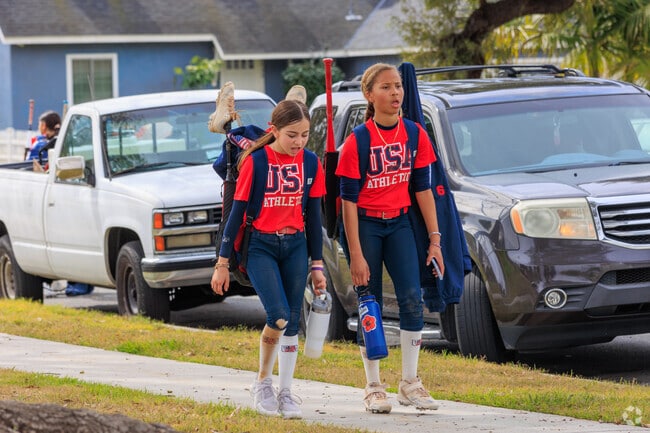 Walking home after a morning softball game in Lindbergh.