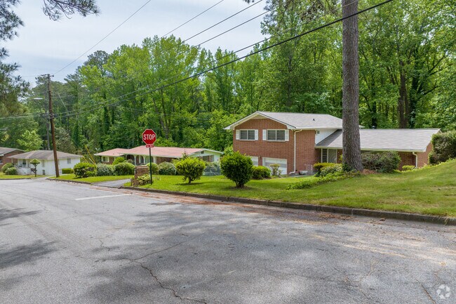 Quiet streets in Peyton Forest boast brick split-level homes that reflect the neighborhood's calm and orderly streetscape.