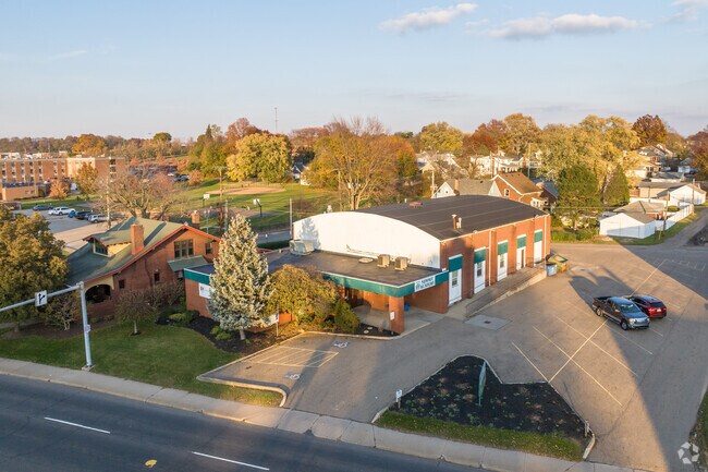 There is a parking lot adjacent to Summit Academy for teachers and guests.