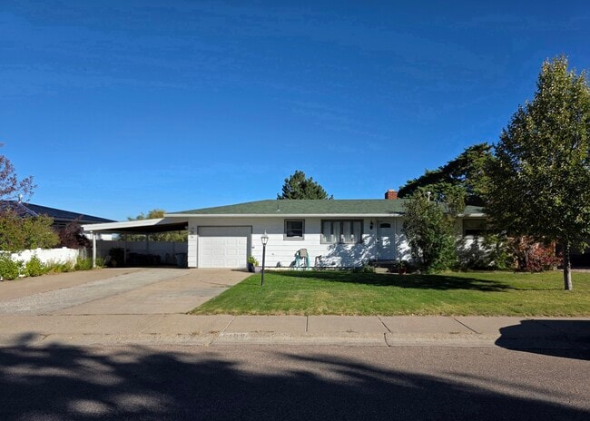 Front with Garage and Carport
