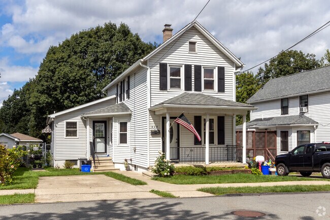 This four-square house has a small addition in Throop.