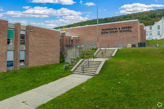 Younger students attend Thirteenth and Green Elementary School.
