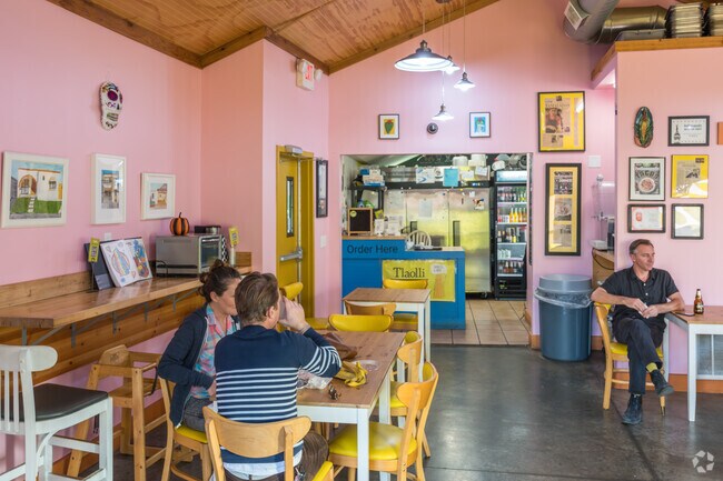 Customers enjoy the comfortable atmosphere at Tlaolli in Near Eastside fresh and unique tacos.