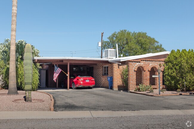 Most of the homes in Longview Estates have a brick exterior, arched windows and a carport.