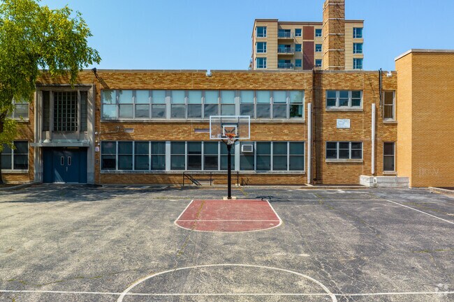 Brown W Elementary School has a playground that includes a full size basketball court.