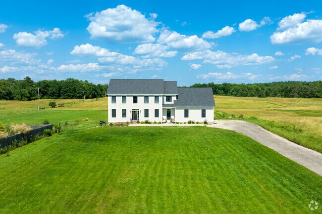 Living in North Yarmouth means having long yards and vasts amounts of privacy.