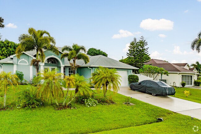 Saint Lucie North homes feature colorful stucco siding for a Mediterranean-inspired look.