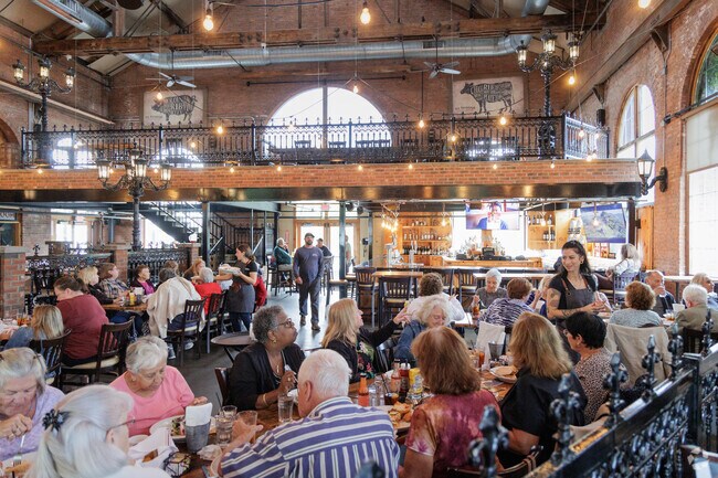A large crowd enjoys lunch at the Ole Savannah Southern Table and Bar.