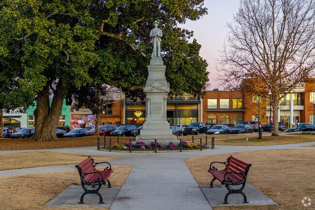Covington Square features a Confederate War Memorial, made of stone.
