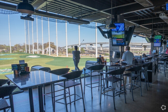 Take the short drive to Top Golf for fun with friends near Highland Park.