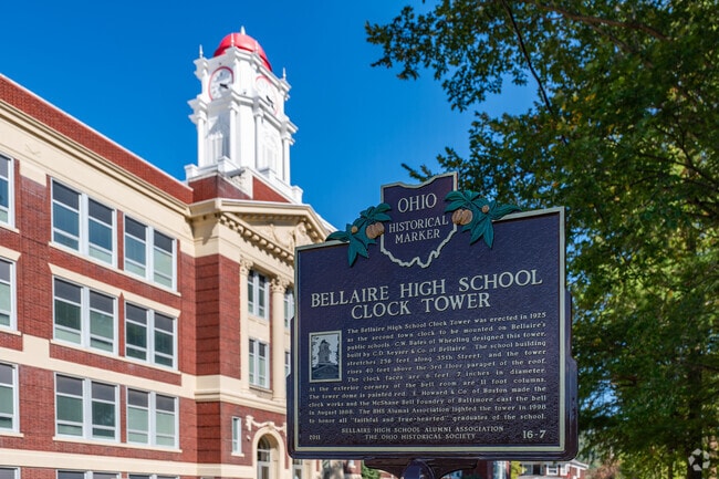 The clock tower on top of Bellaire High School has a historical marker telling the story of it.