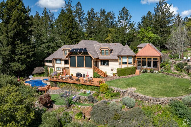 A Mediterranean-style home is perched on the hillside in Montecito Heights with a sweeping view.