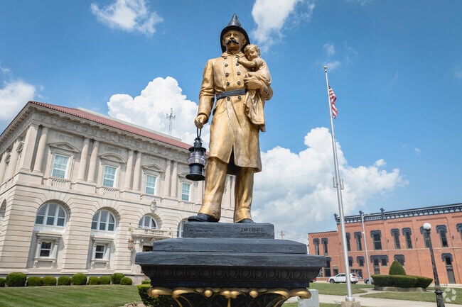 The Putnam County Firefighters Memorial Statue looks out from the courthouse yard in downtown Ottawa.