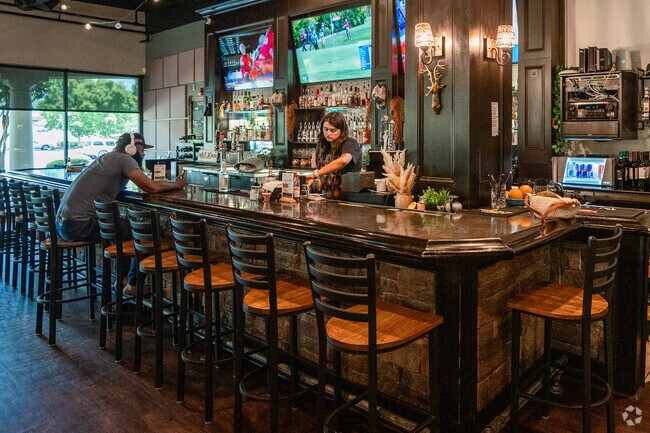 Many locals gather at the Wakefield Tavern near the Bedford at Falls River community.