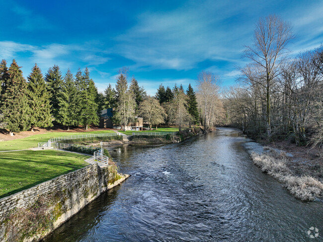 A small river brings serenity to walkers in Cedar River.