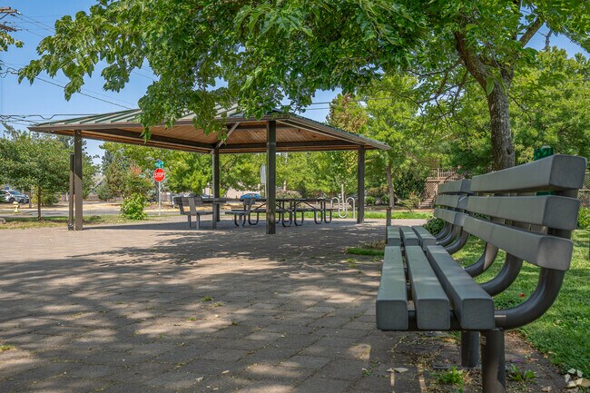 Relaxing gazebo and park benches at Grant Park in Salem, Oregon.