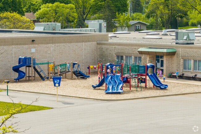 Children at St. Joseph Elementary School in Wauwatosa, WI can play on the playground on break.