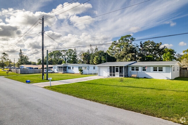 A row of older ranch-style homes lines Ormond Terrace in Ormond Beach.
