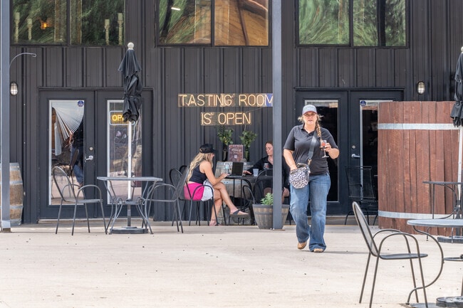 Savor the flavors of New Mexico wines and unique charm at Enchanted Vine by Noisy Water Winery in Alto.