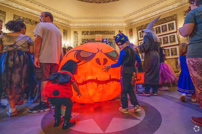 The kids love to dance with the pumpkin during the Trick or Treat at Woburn City Hall.