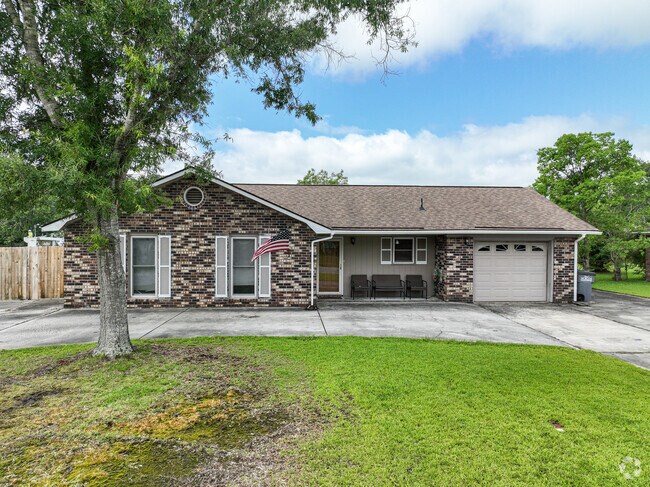Some ranch style homes in Forest Hills have long paved driveways and one-car garages to park on.