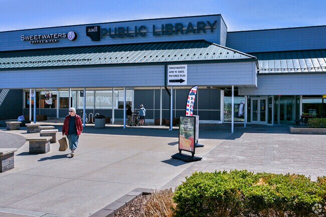 Residents enjoy a day at the library, located in the Westgate Shopping Center.