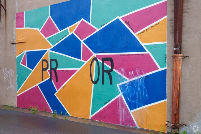 A vibrant mural in downtown Pryor Creek adds a splash of color and local pride to the street.