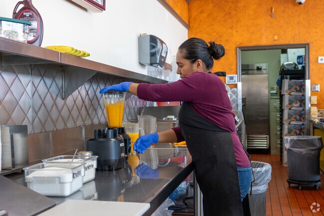 Tortas Y Jugos Caribe makes fresh juice for the community of Tower Heights.