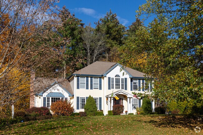 Spacious lots framed by tall trees accompany homes in Pelham.