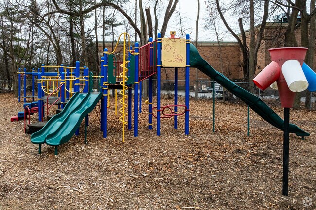 Children enjoy modern and fun playground equipment at Metropolitan Junior Academy.