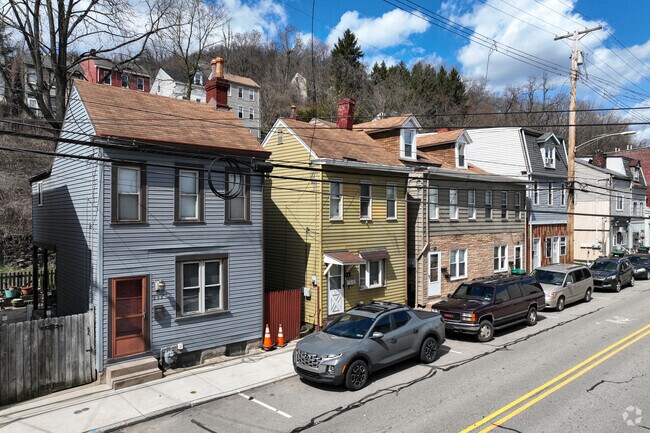 Public parking is available near Millvale’s central business area.