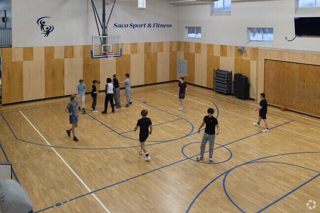 Youths engage in a game of indoor basketball at Saco Sport and Fitness in Central Saco.