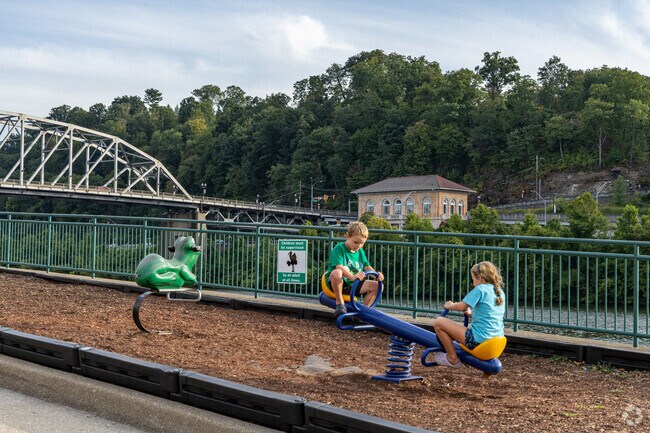 Haddad Riverfront Park offers beautiful views and a fun small playground for children.