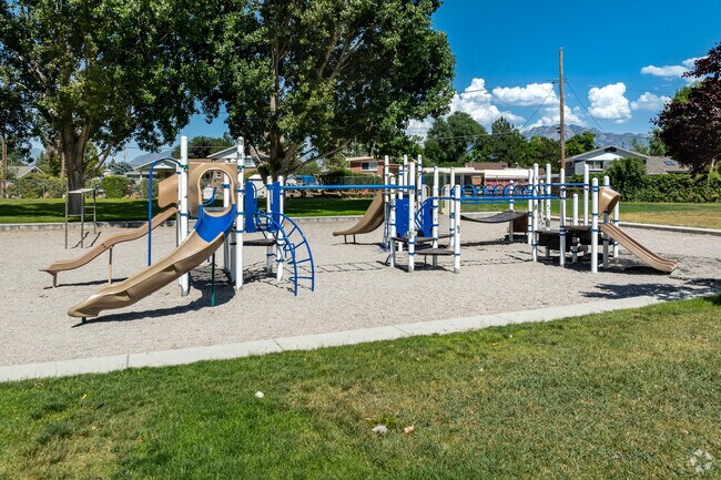 Several shade trees surround John C. Fremont Elementary School’s playground.