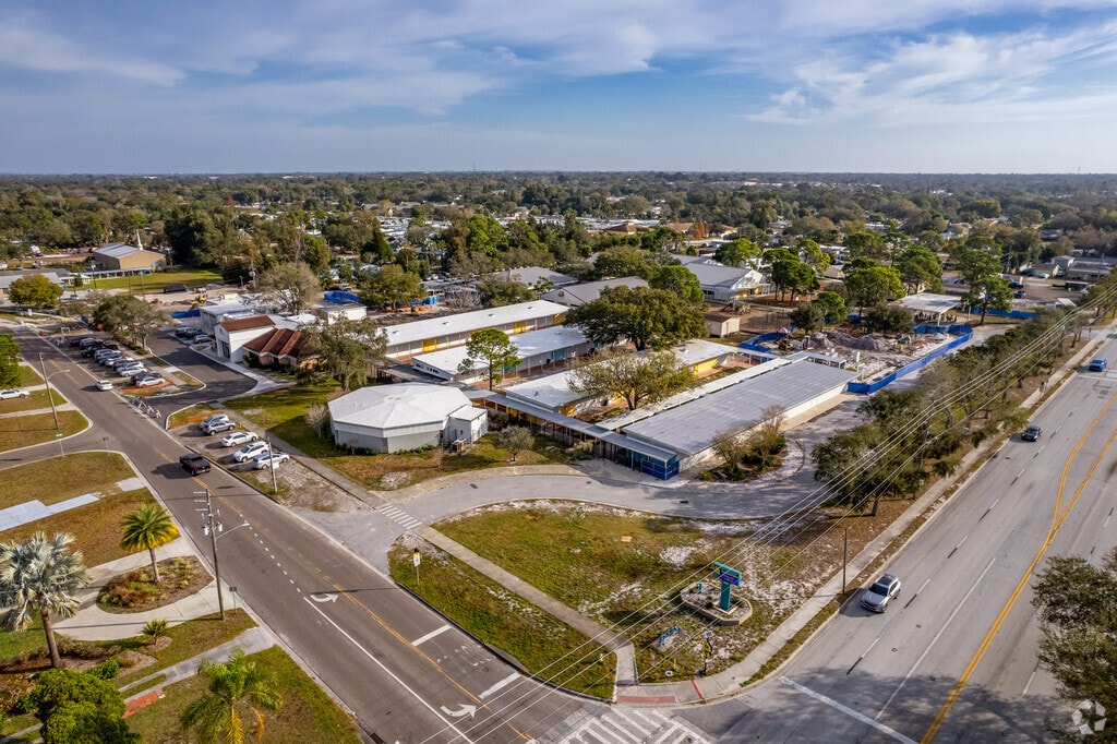 Trees and greenery surround Seventy-Fourth St. Elementary School.