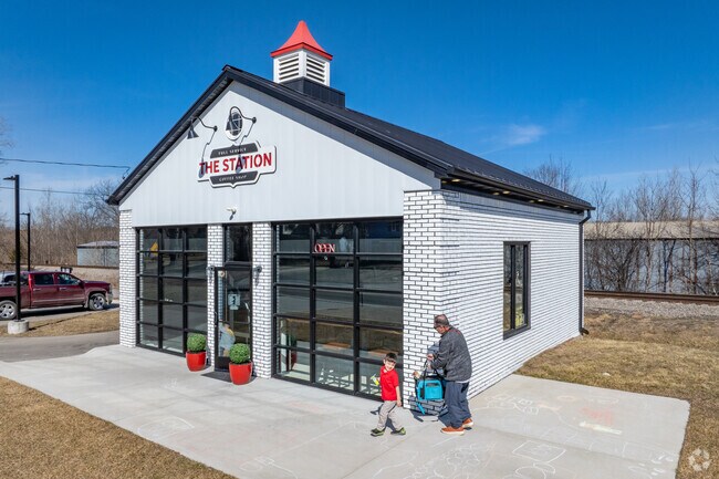 Flushing locals enjoy The Station, a coffee shop in a renovated and repurposed gas station.