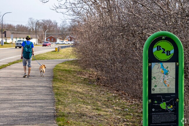 The Border to Border trail runs along Gault Village's southern edge on Ford Lake's shoreline.