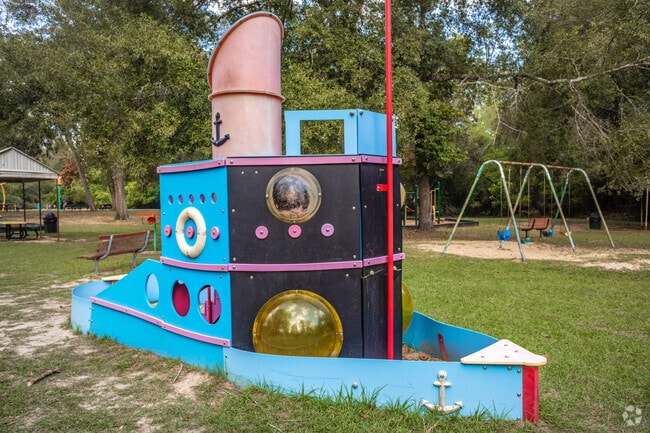 Sculptures created by local artists can be found doubling as a child's play area in Roman Forest
