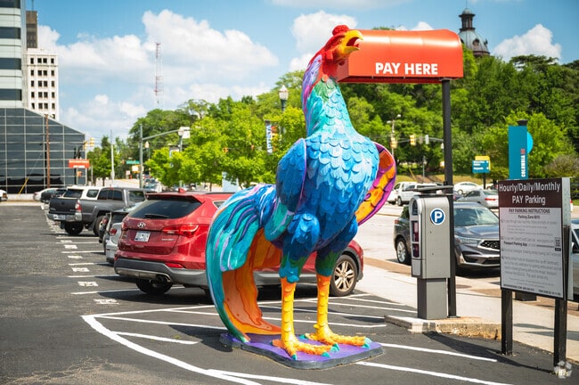The statue on Gervais Street adds a splash of color and creativity to the heart of the city.