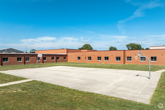 An outdoor basketball court is part of the campus at Strafford Elementary School.