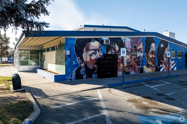 Libby C Booth Elementary School has a colorful mural off to the side of the front exterior.