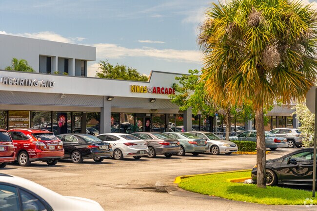 The Kings Point shopping plaza offers local retail stores and arcade and market.